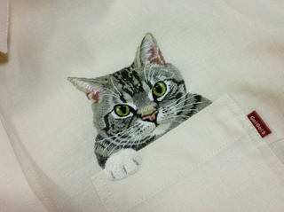 Illustration for article titled Internet Cats Make Boring Dress Shirts Better